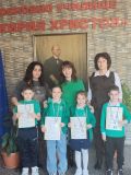 Първокласници впечатлиха с кукерски маски в Национален конкурс „Сирни заговезни 2026“ - ОУ Кирил Христов - Стара Загора